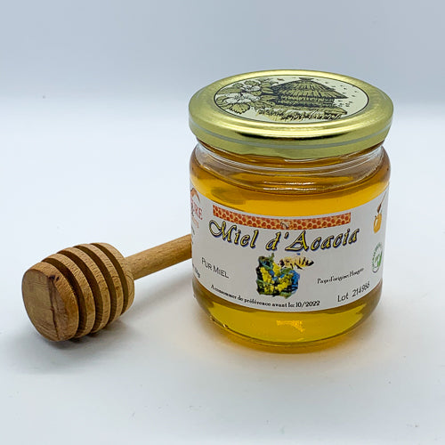 Pot de miel d’acacia pur, couleur dorée et texture fluide, idéal en cuisine et soins naturels.